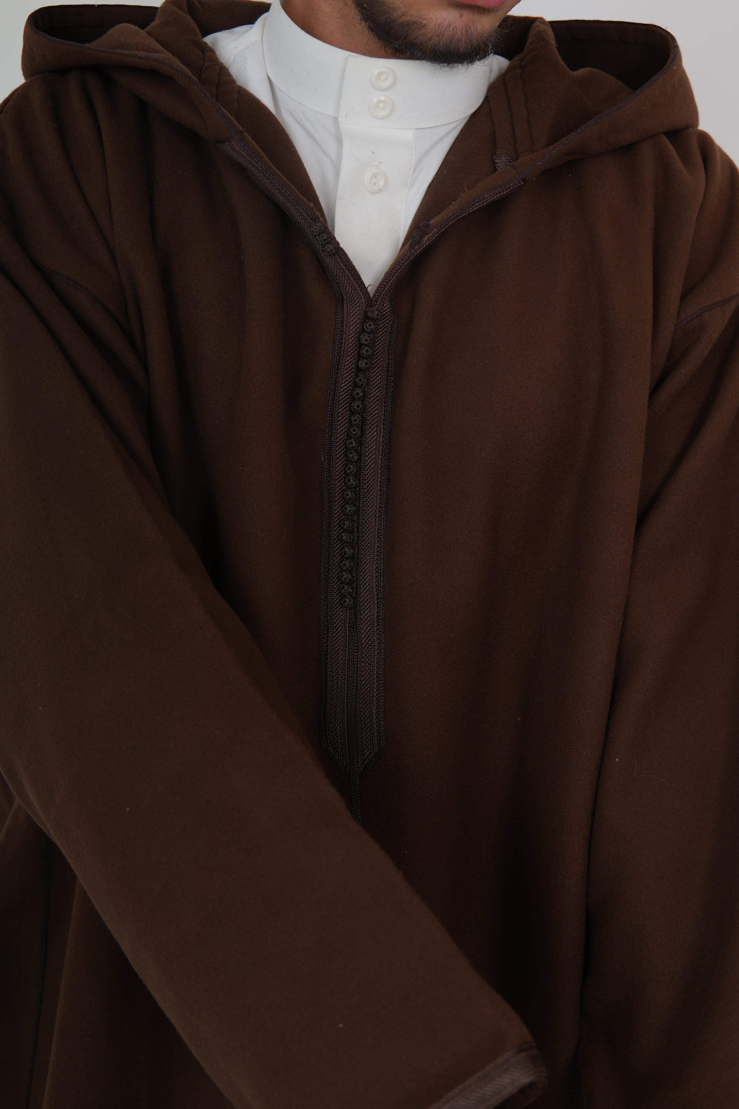 Man wearing a White Moroccan Djellaba – traditional hooded thobe robe
