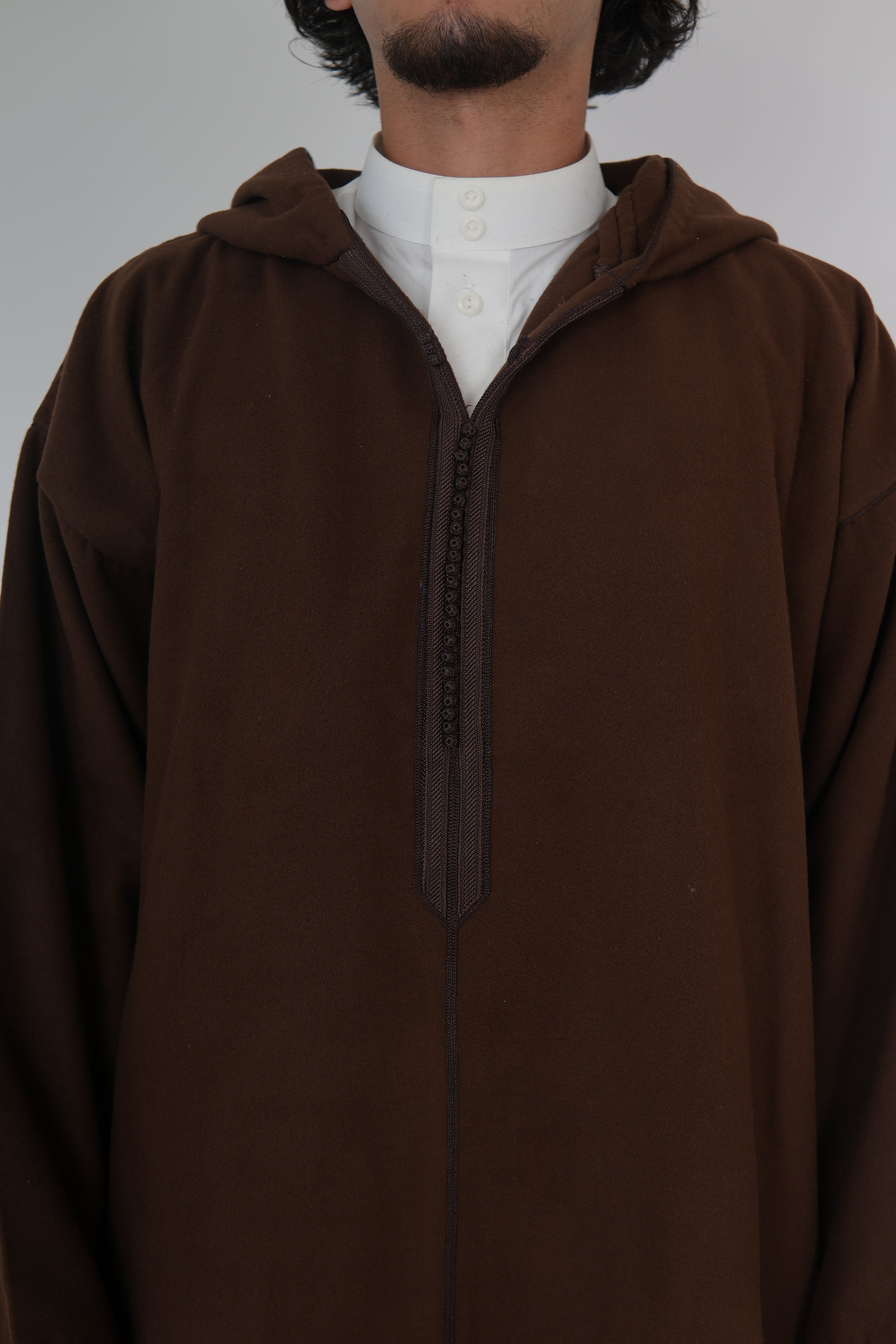 Man wearing a White Moroccan Djellaba – traditional hooded thobe robe